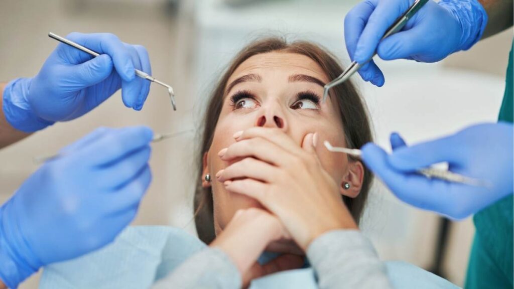 girl holding Invisalign Clear Aligners