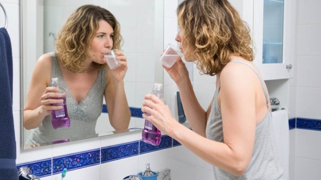 girl holding Invisalign Clear Aligners